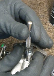 Setting Carburetor Lead Shot with Punch