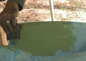Applying Fairing Compound to Transom Repair